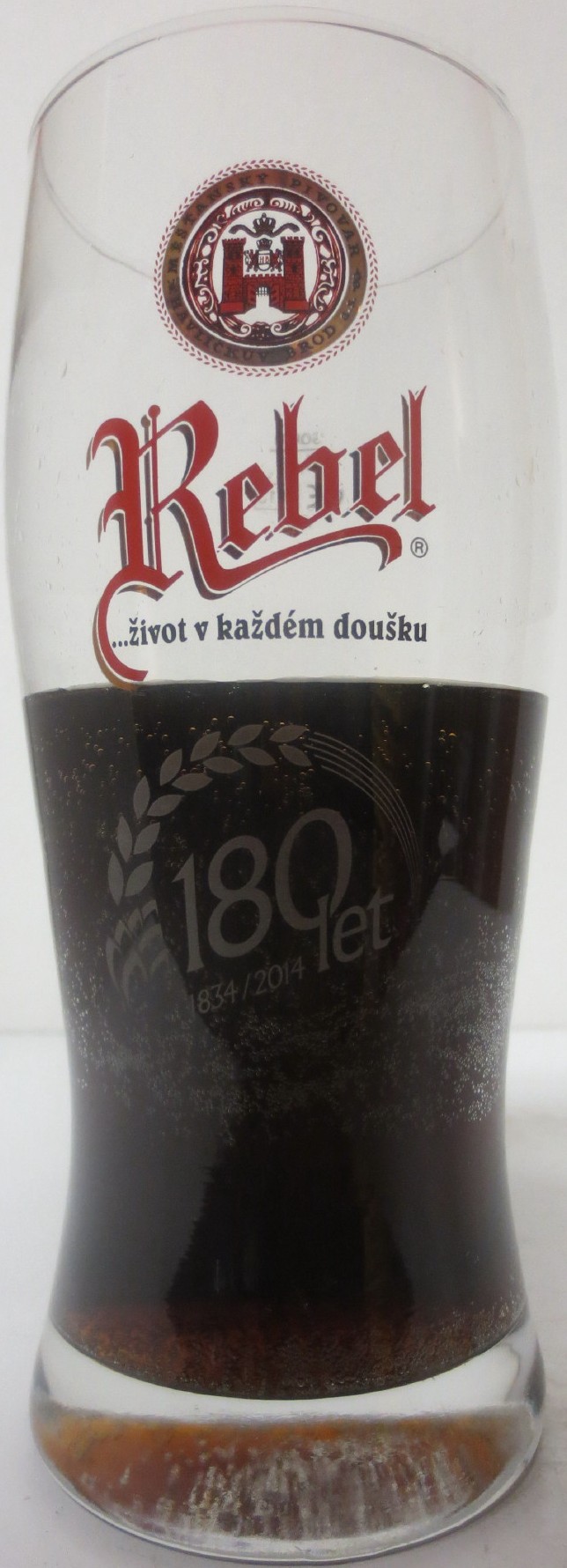 Rebel ...život v každém doušku 180 let 1834-2014 (0,5L) Cadera